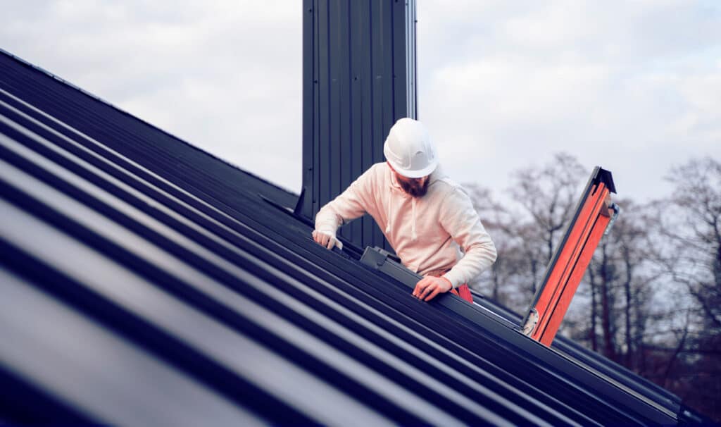 chimney worker on roof